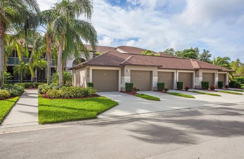 Naples Heritage Condo | Beautiful 1st. floor unit totally renovated with lake view!