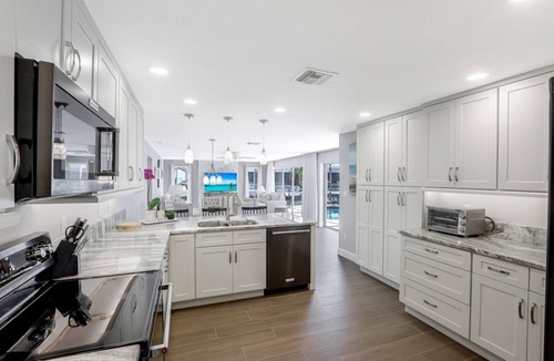 Marco Island House | Beautiful 4/2.5 waterfront home with a heated pool