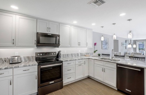 Marco Island House | Beautiful 4/2.5 waterfront home with a heated pool