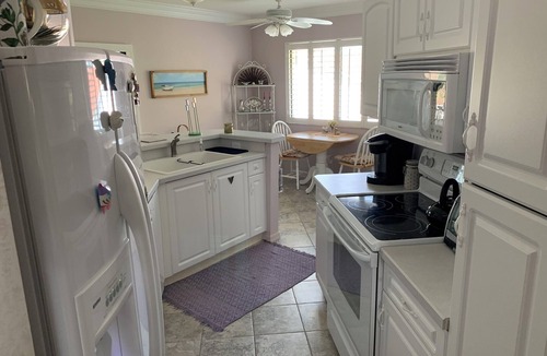 Naples Condo | Beautiful and Spacious Coach Home