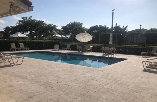 Hamptons at Boca Raton House | Beautiful Boca Home for Snowbirds & Families enjoy the pool pickleball & tennis