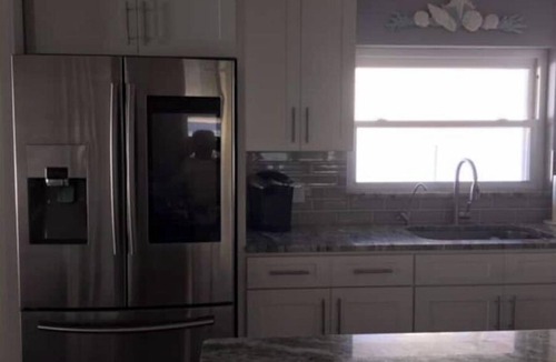 Neptune Beach House | Beautiful Coastal Beach Home - 2 min walk to Beach- 4 bedroom 3 bath 2 masters!n