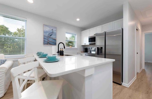 Neptune Beach Apartment | Beautiful coastal condo - walk to the beach!