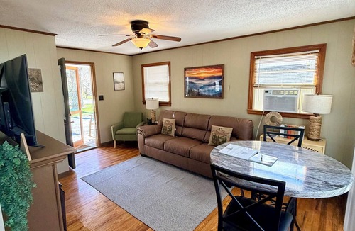 Maggie Valley Cottage | Beautiful Creekside Cottage with Private Deck in Maggie Valley