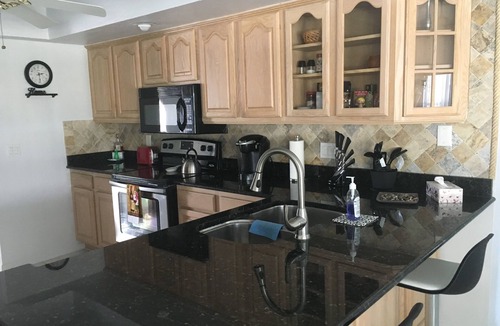 Pelican Villa | Beautiful Gulf access canal views with heated pool.