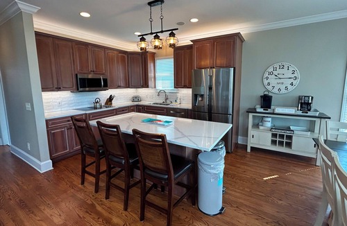Ocean Point House | Beautiful home with open porches overlooking lagoon in Wild Dunes