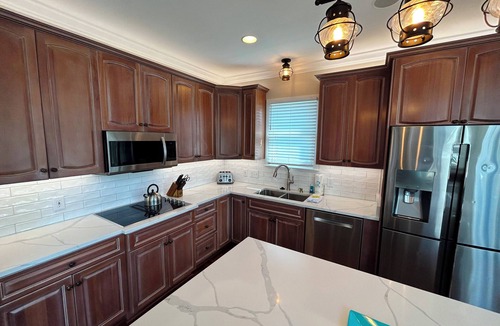 Ocean Point House | Beautiful home with open porches overlooking lagoon in Wild Dunes