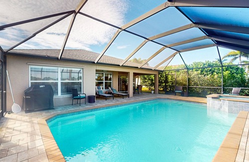 Beachwalk Isles House | Beautiful Lakefront Home with Private Pool/Spa, Furnished Lanai, Grill, & WiFi