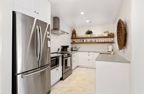 Isle of Palms House | Beautiful Pet Friendly Beach House with Private Backyard Oasis.