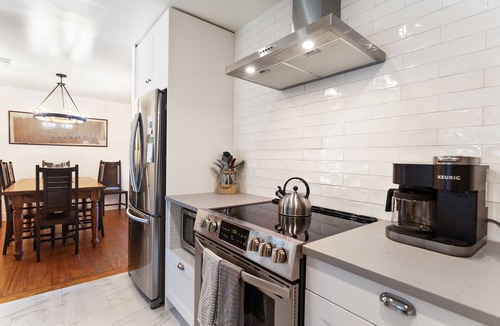 Isle of Palms House | Beautiful Pet Friendly Beach House with Private Backyard Oasis.
