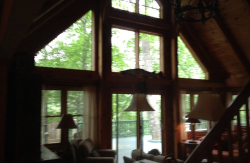 Lakemont Cabin | Beautiful Rustic Timberframe Lake House and Boat House Amid Trees