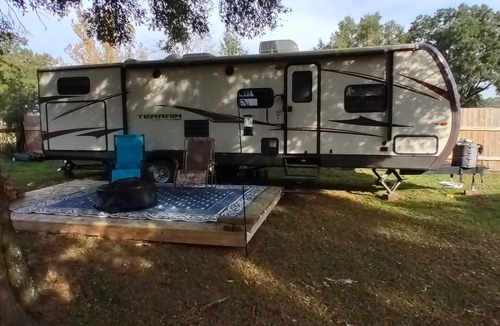 Dade City House | Beautiful travel trailer with private fenced in yard, deck, and fire pit.
