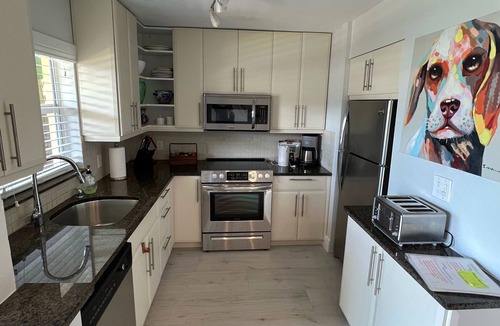 Harbor Village Condo | Beautiful Waterfront Condo. Walk to the beach, shops, restaurants & more!