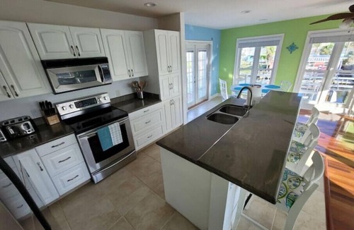 Matlacha House | Beautiful waterfront home with pool/spa, boat lift, kayaks and kayak launch!