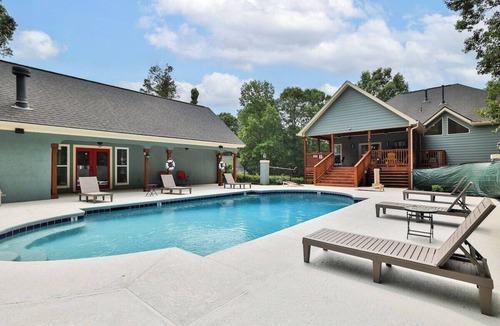 Rex House | Beautifully decorated and spacious home with a pool.
