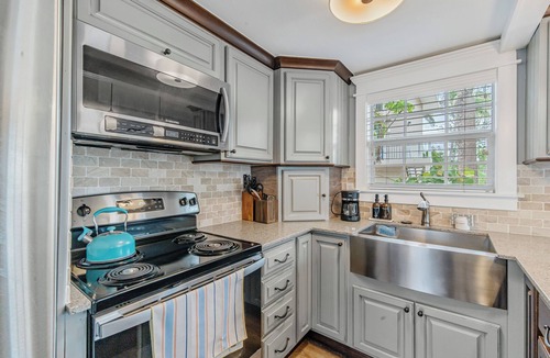 Holmes Beach House | Best Little Beach House on Anna Maria Island! With a pool & steps to the beach!