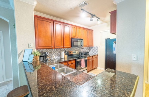 Wellington Condo | Big 4BR by Disney – 2 Pools, Patio, 2 Suites, W/D