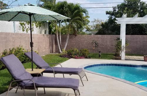 Naples Park House | Bike to beach! Heated pool, pet-friendly. Summer 2025 sale!