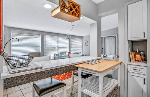 Greater Pinellas Point House | Blooming oasis near the ocean with a hot tub, adult bikes & grill - dog-friendly