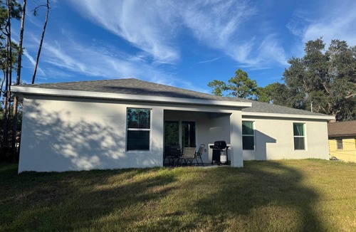 Port Charlotte House | Blue Mantle Charlotte Hideaway
