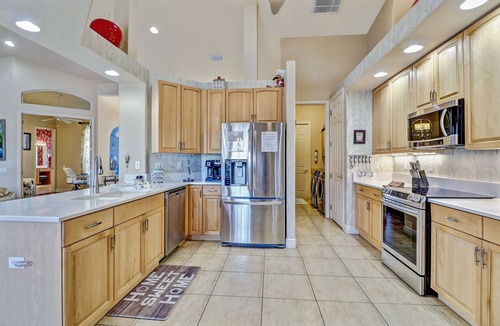 Pelican House | Blue Water 1022 Cape Coral Gulf Access Pool & Spa Home w/large Dock a. Tiki Hut
