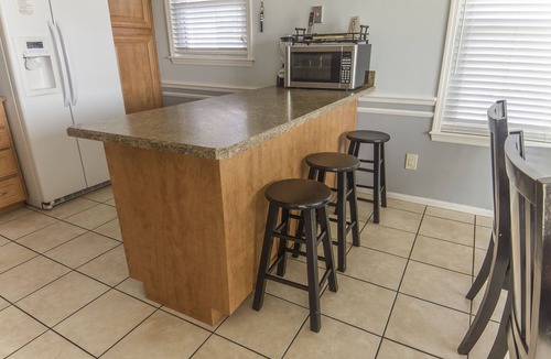 Surfcrest Village Condo | Bluefish 16 | Pet-Friendly Beach House with Balcony, Deck, Beach + Pool Access