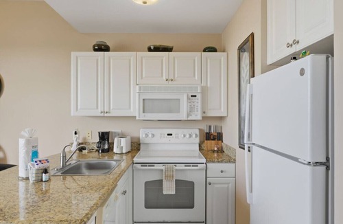 St. Petersburg Condo | Boca Ciega Bay Resort – Top Floor Waterfront Condo with Bay Views