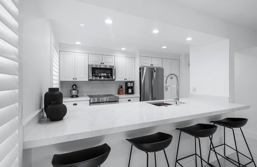 Hunt Club Condo | Brand New 2024 Home on PGA National Golf Course by Guaranteed Rental™