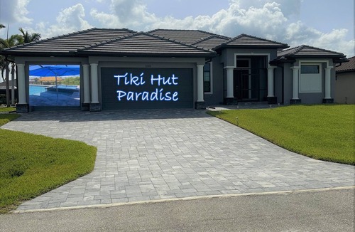South Gulf Cove House | Brand New Luxury One Of A Kind Waterfront Home With Pool, Spa & Tiki Hut!