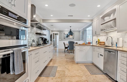 Dolphin Isles House | Breathtaking Oasis, Steps to Beach, Heated Pool, In-ground Spa VIRTUAL TOUR