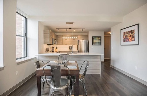 Midtown Village Apartment | Bright 2BR home steps away from City Hall
