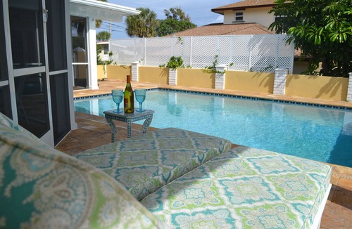 Juno Beach House | Bright, airy private home with pool steps to beach