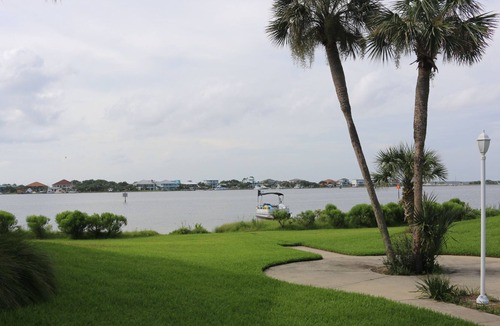 Villa Sabine Condo | Bright and Fun Beach Themed Condo - On Little Sabine Bay