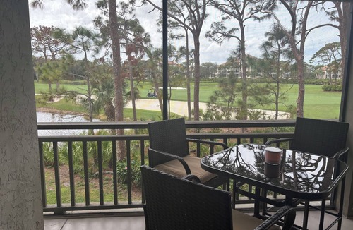 Bonita Bay Condo | Bright & beautiful with lake and golf course views!
