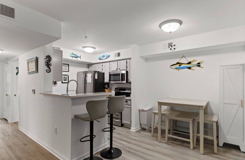 Indian Bayou Condo | Bright, coastal-chic 2BR/2BA retreat mins from the beach! Features a fully stocked kitchen, plush queen bed, cozy second bedroom, and 2 full baths. Enjoy access to the community pool and fitness center. Near Destin Harbor, shopping, and dining!