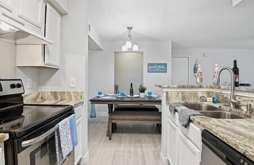 Indian Bayou Apartment | Bright Coastal Condo Pool Minutes to Crystal Beach