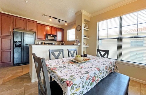 Regal Palms Condo | Bright condo with south facing balcony overlooking pond