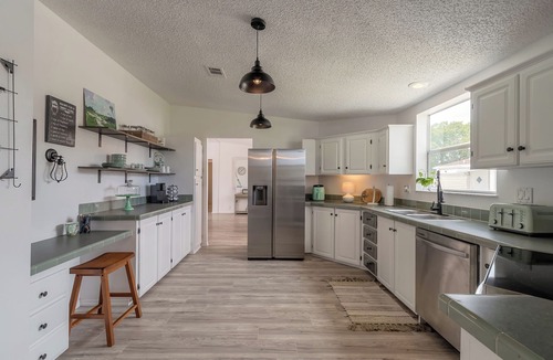 Edgewater House | Bright & Spacious Home with ICW access, two community pools and a boat launch.