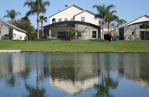 Lake Berkley Villa | BrightwaterVilla. Lake view, west facing extra large pool deck, lanai, hot tub