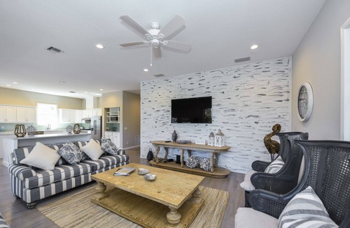 Anna Maria House | Canal front Home with Private Dock, Pool, Games, and Water Adventures