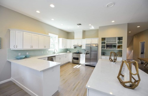 Anna Maria House | Canal front Home with Private Dock, Pool, Games, and Water Adventures