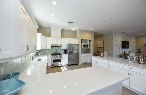 Anna Maria House | Canal front Home with Private Dock, Pool, Games, and Water Adventures