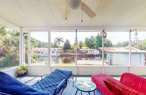 Astor House | Canal-Front Home with Private Covered Boat Dock & Waterfront Screened Porch