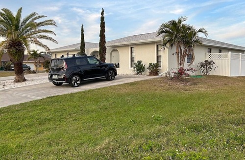 Oakland Hills House | Canal frontNear Boca grand beach in rotonda west