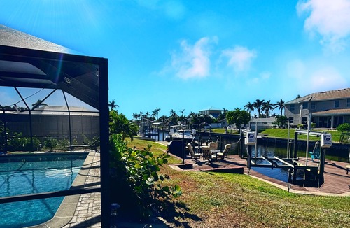 Yacht Club House | Cape Coral VIP Heated Pool, Spa, Direct access Boat lift, Gameroom, Scooters