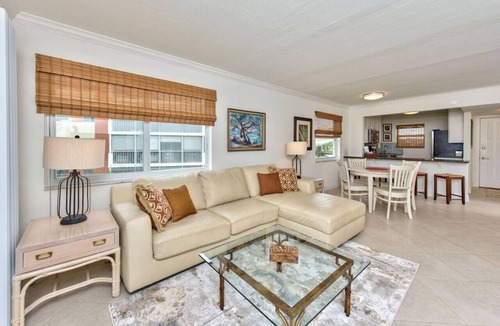 Lely Golf Estates Condo | Capri Vacation Rental: newly upgraded 2-bed, 2-bath condo in Lely Golf Resort, just a short drive from 5th Avenue, golf courses, and dining. Enjoy stunning views of the 10th hole and resort-style pool, plus convenient access to all amenities