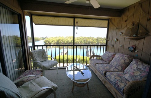 Bokeelia House | Captain's Harbor Condo Relax: on your private screened balcony and enjoy the scenery just outside this gorgeous condo.