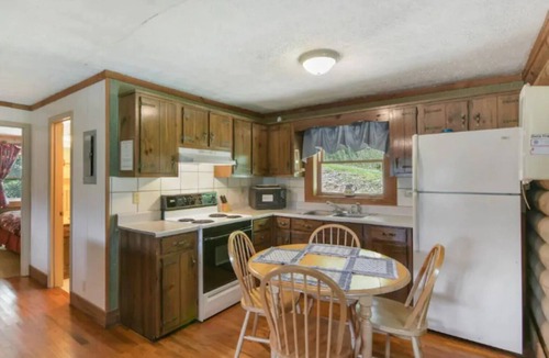 Ellijay Cabin | Carters Lake Lakeside Log Cabin #2 includes boat slip at the marina