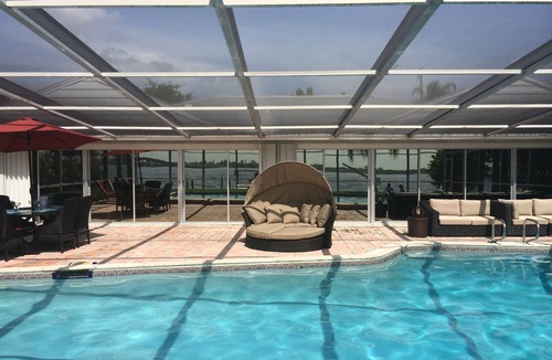 Caloosahatchee House | Casa Del Rio, Tropical Resort Feel, Breathtaking River Views, Large Pool & Dock