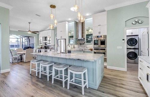 Pelican House | Cecilia 1015 Modern SW Cape Gulf Access Home w/heated Pool & Spa